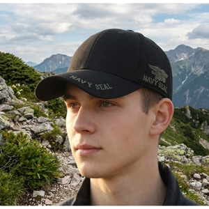 Detailed embroidery of Navy Seal logo on a tactical black baseball cap for outdoor sports