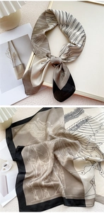 Détail de la texture du foulard en soie avec des motifs de lignes abstraites élégants