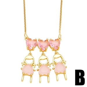 Gold chain necklace featuring pink heart-shaped stones and three little girl pendants