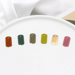 Matte finish rectangular alloy letter tags in multiple Morandi colors for DIY jewelry making