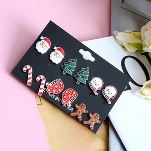 6-pair Christmas stud earring set featuring Santa, tree, and gingerbread man designs