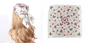 Detail of light green 60cm square silk scarf with elegant pink butterfly floral print