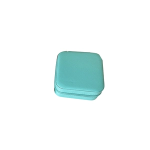 Portable cyan PU leather square jewelry travel case with a secure zipper closure