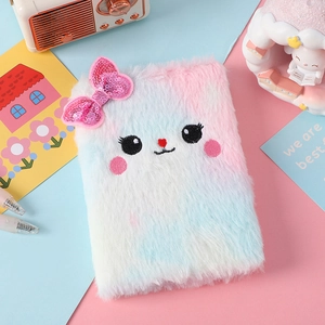 Quaderno di peluche sfumato con fiocco di paillettes e ricami su sfondo rosa e blu