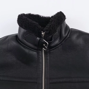 Women's black leather fleece-lined jacket with textured collar and metallic zipper