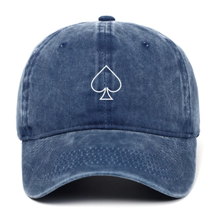 Close-up of heart spade embroidery on washed blue denim cotton baseball cap
