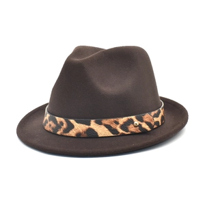 Close-up of dark brown wool felt fedora featuring a leopard print belt with gold rivet
