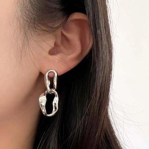 Minimalist silver chain drop earrings with textured oval interlocking metal rings