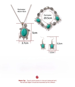 Detail view of turquoise turtle jewelry set with necklace and bracelet size measurements