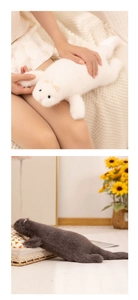 Close-up of soft white plush ferret doll with realistic faux fur texture and pink nose