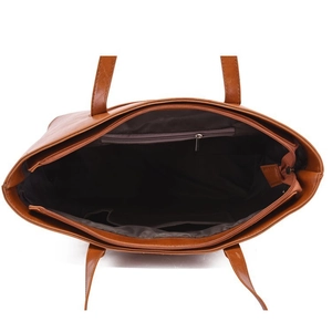 Interior view of brown tote bag showing zipper pocket and spacious compartments