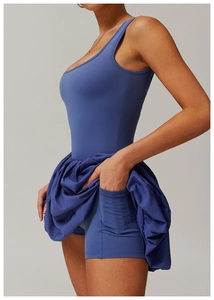 Detail view of athletic dress with built-in shorts and functional side pocket for tennis