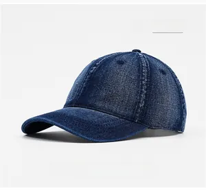 Detailed macro view of navy blue washed denim baseball cap with vintage worn texture