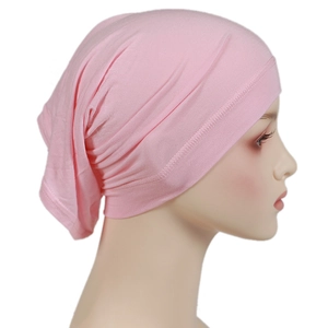 Detail view of pink modal hijab cap showing soft stretch fabric and side profile fit