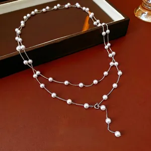 French vintage double-layered pearl necklace with silver chain and elegant pendant