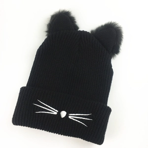 Cute black knit beanie for women with cat ears, white whiskers embroidery and fuzzy poms