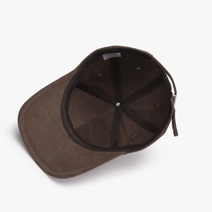 Brown cotton baseball cap interior view showing stitched lining and size label details