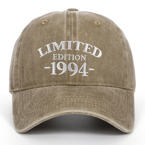 Macro detail of LIMITED EDITION 1994 white embroidery on vintage washed cotton baseball cap