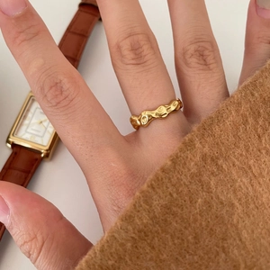 Minimalist gold irregular wave ring with liquid lava texture for women's elegant style