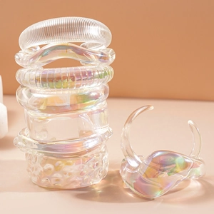 Iridescent acrylic geometric bangles with holographic finish and diverse textures