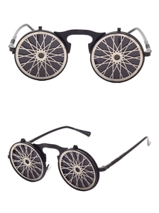 Macro detail of steampunk flip sunglasses with silver radial wheel gear metal design