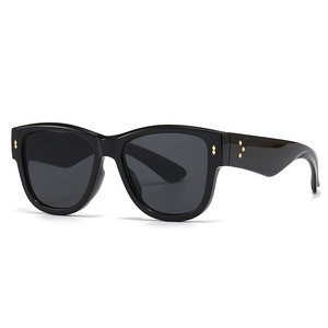 Classic black oversized square cat-eye sunglasses with gold metal temple details