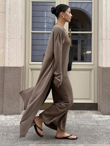 Chic brown longline knit cardigan and matching wide-leg pants set street style view