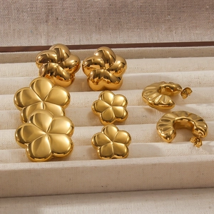 Polished 18K gold titanium steel earrings set featuring floral and hollow pumpkin designs