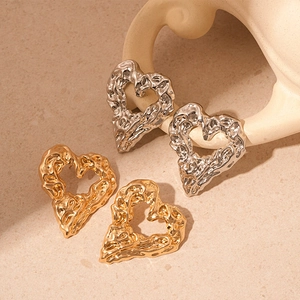 Lava textured heart-shaped stud earrings in gold and silver finish with hollow design