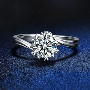 Elegant six-prong snowflake silver ring with round sparkling one carat moissanite gemstone