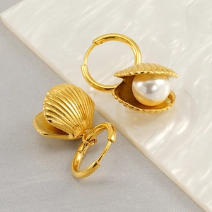 Golden shell hoop earrings with white pearls, elegant minimalist jewelry set for women