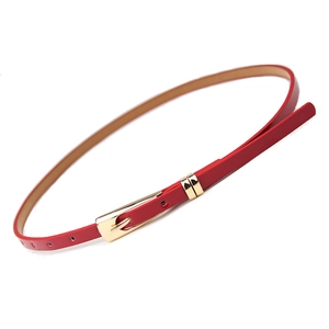 Slim red fashion waist belt for women featuring a polished gold metal buckle and dual loops