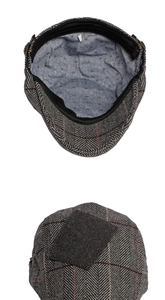 Detail of wool newsboy cap showing herringbone pattern and floral cotton lining