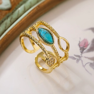 Macro view of 18K gold plated open ring featuring turquoise and multi-layer hollow structure