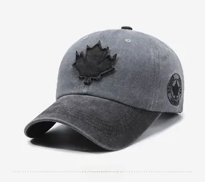 Close-up of vintage washed baseball cap featuring maple leaf patch and side embroidery