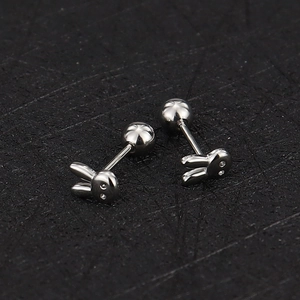 Detailed macro view of 16g stainless steel bunny ear studs with screw ball backings