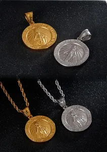 Close-up of Virgin Mary relief on gold and silver round pendants with rope chain