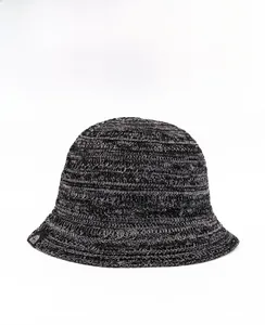 Detailed view of breathable knit bucket hat showing mixed grey texture and side branding tag
