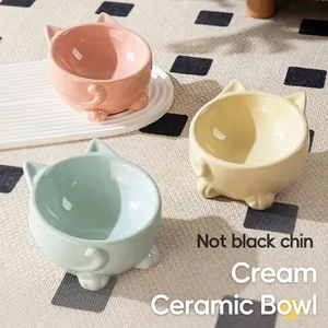 Three elevated ceramic cat bowls with cute ear design and cat claw stands in pastel colors