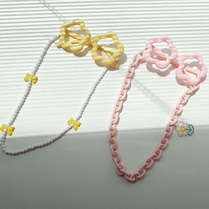 Kids flower-shaped sunglasses with decorative chains in yellow and pink, 2-piece set