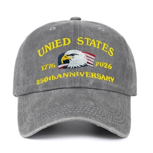 Close-up of high-quality embroidery with eagle and flag on washed grey baseball cap