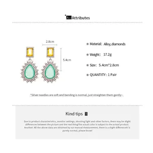 Detailed dimensions of vintage teardrop earrings showing 5.4cm height and 2.8cm width