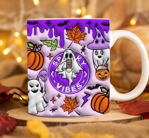 Close-up of Halloween ceramic mug with Spooky Vibes pumpkin design on a wooden coaster