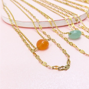 Double-layer gold titanium steel necklace with oval natural stone pendants in green and orange