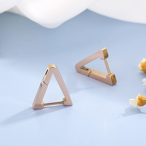 Minimalist rose gold stainless steel triangle hoop earrings shown in side-top view
