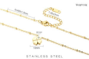 Detail view of golden stainless steel clover necklace with zircon and size specifications