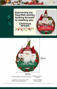 Detailed view of 30x38cm Christmas rattan wreath with snowman figures and Merry Christmas sign