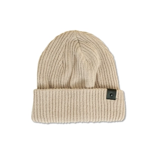 Close-up of ribbed knit texture on beige beanie featuring a black leather favorite patch