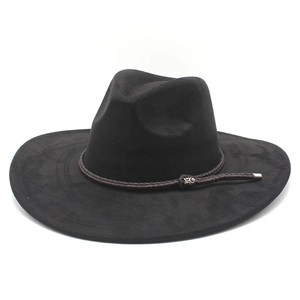Macro detail of black suede wide brim fedora with brown leather braided band and silver buckle