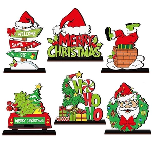 Set of 6 festive wooden Christmas table ornaments featuring Santa and holiday signs